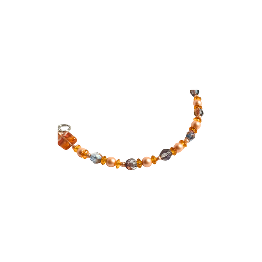 Beautiful orange bracelet with a mix of clear and light purple tones: Handmade Fashion Jewelry