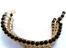 Load image into Gallery viewer, Enchanting Black and White Bracelet
