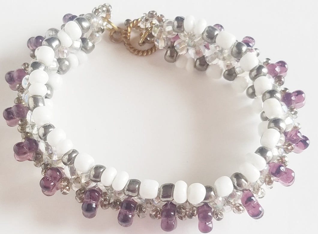 Amethyst purple, white, and golden Bracelet